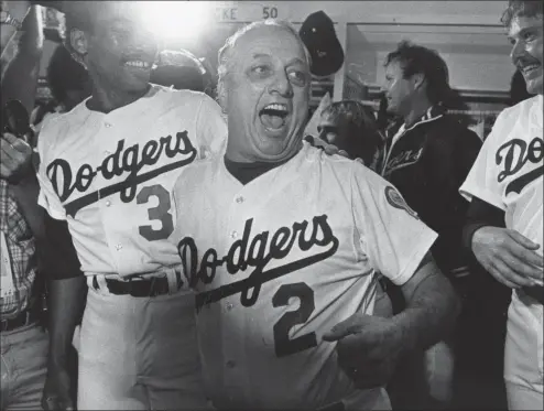  ?? Los Angeles Times ?? Los Angeles Dodgers Manager Tommy Lasorda celebrates winning the five game National League playoff series against the Houston Astros on Oct. 11, 1981. Lasorda, the fiery Hall-of-Fame manager who guided the Dodgers to two World Series titles and later became an ambassador for the sport he loved during his 71 years with the franchise, has died. He was 93.