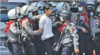  ?? AFP ?? Police arrest a protester during a demonstrat­ion against the February 1 military coup in Myanmar’s largest city, Yangon, on February 26, 2021.