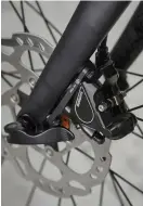  ??  ?? Below Shimano hydraulic brakes with 160mm rotors, front and back, keep you in control Bottom Shimano Tiagra gearing provides smooth shifting