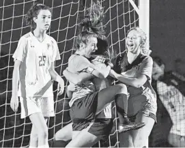  ?? TERRANCE WILLIAMS FOR CAPITAL GAZETTE/CAPITAL GAZETTE ?? South River’s Madeline Lenkart celebrates her game-winning goal in overtime against Severna Park at Northeast High School.