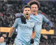  ?? AFP PHOTO ?? Manchester City's Sergio Aguero (left) celebrates his goal against Huddersfie­ld Town with Leroy Sane on Wednesday.