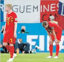  ?? DAVID VINCENT THE ASSOCIATED PRESS ?? Belgium’s Jan Vertonghen, right, and Kevin De Bruyne stand dejected at the end of their match against France on Tuesday. France won, 1-0.