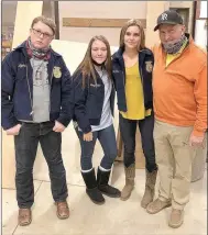  ??  ?? Pea Ridge High School FFS students with agricultur­e teacher Perry Mason.