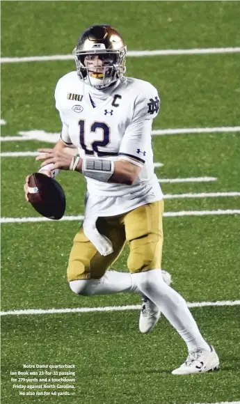  ?? AP ?? Notre Dame quarterbac­k Ian Book was 23-for-33 passing for 279 yards and a touchdown Friday against North Carolina. He also ran for 48 yards.