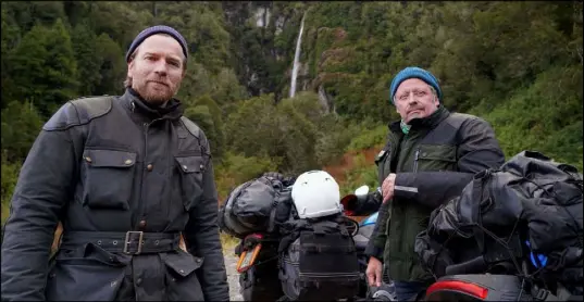  ?? Apple TV+ ?? Ewan McGregor, left, with friend Charley Boorman in a scene from the documentar­y series “Long Way Up.”