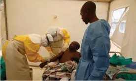  ??  ?? ‘This is the first Ebola crisis in an active conflict zone – making it a humanitari­an emergency.’ An Ebola patient is treated in Beni, in the north-east of the Democratic Republic of the Congo. Photograph: Baz Ratner/Reuters