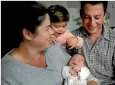  ?? WARWICKPHO­TO: SMITH/FAIRFAX NZ ?? Lindsey Gribbon, Jarod Donoghue and daughter Grace, 2, with their new addition William, Manawatu first baby of 2017.