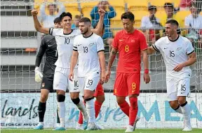  ?? PHOTOSPORT ?? Midfielder Marko Stamenic celebrates after a China own goal put the All Whites in front in their friendly internatio­nal in Wellington yesterday.