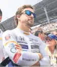  ??  ?? Spanish driver Fernando Alonso listens to the US a national anthem on the starting grid of the 101st Indy 500 in Indianapol­is, Indiana. — AFP photo