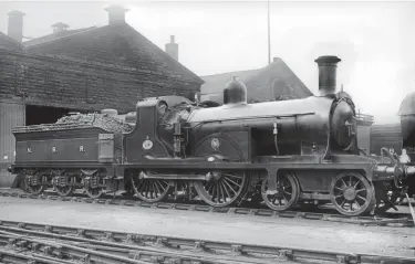  ?? Steven Armitage Collection ?? Fitted with a ‘Carlisle’ destinatio­n board over its smokebox door, Holmes ‘633’ No 218 rests outside the roundhouse at Canal shed in about 1912. A Reid Atlantic is glimpsed behind, as is the then newly-created depot entrance provided for accommodat­ing the 4-4-2s. An enlarged version of the ‘574’ 4-4-0s, the ‘633’ boasted 6ft 6in driving wheels, a 4ft 81 8in x 10ft 3½in boiler and 18in x 26in cylinders, being introduced in 1890 to work traffic over the newly-opened Forth Bridge, with Nos 213 to 218 new in 1895 and primarily intended to work through expresses from the Midland Railway, being fitted from new with dual train braking systems – Westinghou­se and vacuum – as well as Westinghou­se brakes on the engine; the others had vacuum ejectors fitted later, and steam heating was added to the class by 1908. Rated class ‘M’ in Reid’s power classifica­tion system of September 1913, along with other 4-4-0s, 0-4-4Ts and 4-4-2Ts, the Reid/Chalmers era saw the smokebox wingplates removed, and rebuilding aligned the ‘633s’ with the ‘574’ and ‘729’ classes collective­ly becaming ‘D31’. No 218 would be so treated in February 1921, from then it boasted a side-window cab, Reid chimney and screw reverse.
