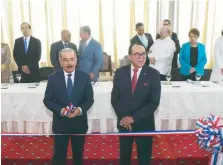  ?? ANEUDY TAVÁREZ ?? Danilo Medina y al fondo Hipólito Mejía, en el acto.