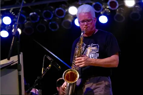  ??  ?? Randy Burt, with his tenor saxophone, plays a solo section of “Doin’ Basie’s Thing” during a performanc­e with the Jimmie Cannon’s Valley Jazz Fest in the 2016 California Mid-Winter Fair &amp; Fiesta in Imperial. JOSELITO VILLERO FILE PHOTO
