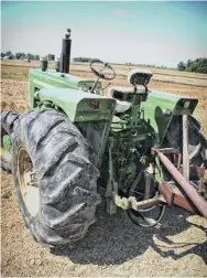  ??  ?? The operator station was on par with the era, but Olivers had a nice seat. They came standard with power steering and a steering wheel that pivoted and telescoped. This tractor was ordered with the Hydra-power drive, which allowed the operator to split THE GEARS ON THE fly. THE BASE models only had the standard 6-SPEED. THERE WERE FINAL drives with high speed gears and some with a creeper gear.