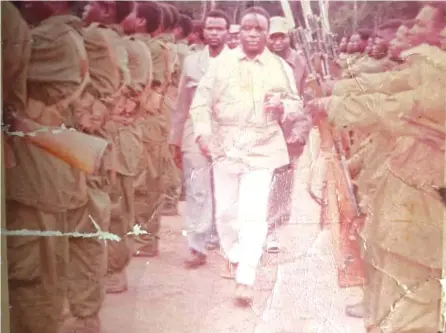  ?? ?? Reverend Ndabaningi Sithole inspects a guard of honour at Mgagao Camp where
ZANLA cadres were being trained during the liberation war.