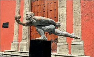  ??  ?? A statue in one of the many courtyards of Mexico City’s National Palace, home to the federal executive as well as Diego Rivera’s The History of Mexico mural.