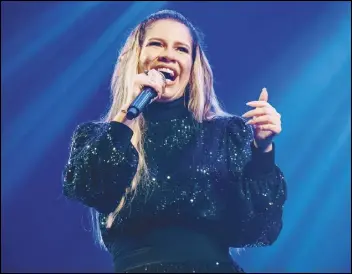  ?? ASSOCIATED PRESS ?? Singer Marilia Mendonça performs during a September concert in Sao Jose dos Campos, Brazil. Mendonça, one of Brazil’s most popular singers and a Latin Grammy winner, died, on Friday, in an airplane crash on her way to a concert. Mendonça was 26.