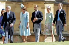  ??  ?? The Middletons attending Prince Harry’s wedding to Meghan Markle in May