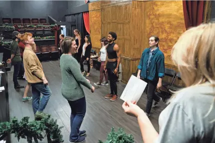  ?? BRYAN TERRY PHOTOS/THE OKLAHOMAN ?? Cast and crew rehearse for Oklahoma Shakespear­e in the Park's production of “Jane Austen's Christmas Cracker” in Oklahoma City on Nov. 28.