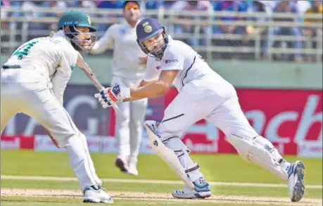  ??  ?? (Above) Rohit Sharma scored the fourth century of his Test career, the first as an opener and (below) Mayank Agarwal, who gave Rohit good company, notched up his fourth Test half-century, on Tuesday at the YSR ACA-VDCA Stadium in Visakhapat­nam. PTI PHOTO