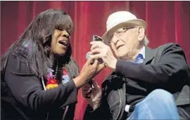  ?? Timothy Hiatt Getty Images ?? CHAZ EBERT, widow of Roger Ebert, and Norman Lear at Ebertfest in 2017.