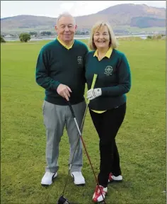  ?? Photos: Ken Finegan. ?? Greenore Captains Michael Mallie and Mary Ryan at the Greenore Golf Club Captains’ Drive-in.