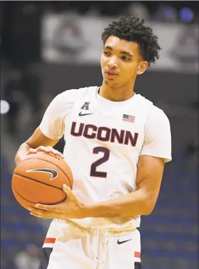  ?? Jessica Hill / Associated Press ?? UConn’s James Bouknight in action during a game in December in Hartford.