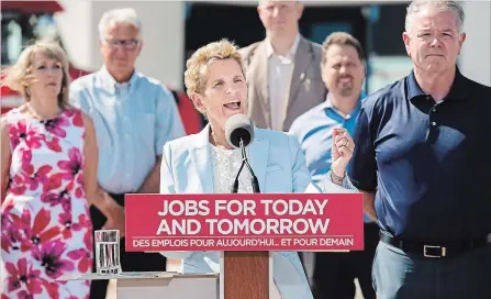  ?? NATHAN DENETTE THE CANADIAN PRESS ?? Ontario Liberal Leader Kathleen Wynne speaks to a crowd during a campaign stop in Oakville, Ont., on Tuesday.