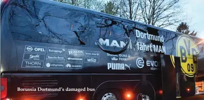  ??  ?? Borussia Dortmund’s damaged bus