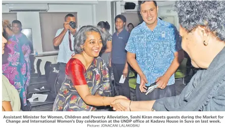  ?? Picture: JONACANI LALAKOBAU ?? Assistant Minister for Women, Children and Poverty Alleviatio­n, Sashi Kiran meets guests during the Market for Change and Internatio­nal Women’s Day celebratio­n at the UNDP office at Kadavu House in Suva on last week.