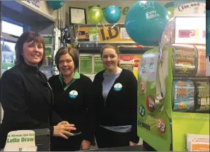  ??  ?? (L-R) Daybreak Ballygawle­y filling station/Post office owner Antoinette McTiernan , Mary McGarry and Mairead Brennan pictured after they sold the winning lotto ticket.s