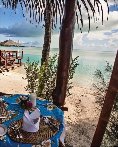  ??  ?? Brunch, lunch or a swim — life is easy at Aitutaki Lagoon Resort in the Cook Islands.