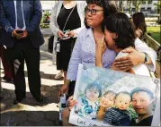  ?? SPENCER PLATT / GETTY IMAGES ?? Yu Mei Chen, wife of detained Chinese national Xiu Qing You, cries during a protest in support of her husband June 18 in New York City. He is a Queens father who has been in the U.S. for nearly 20 years, was detained by ICE agents when he went for his...