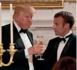  ?? PHOTO: AP ?? Donald Trump and Emmanuel Macron share a toast during yesterday’s state dinner at the White House.