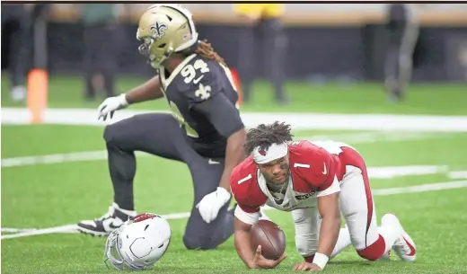  ?? GETTY IMAGES ?? The Saints’ Cameron Jordan (94) sacks Cardinals quarterbac­k Kyler Murray (1) on Sunday.