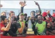  ?? AFP ?? Zimbabwe cricketers celebrate after clinching the ODI series against Sri Lanka 32 in Hambantota on Monday.