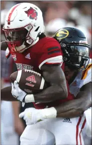  ?? (Arkansas Democrat-Gazette/Thomas Metthe) ?? Arkansas State running backs Johnnie Lang (above) and Brian Snead “jell together,” according to Coach Butch Jones, who also said, “They play off each other.”