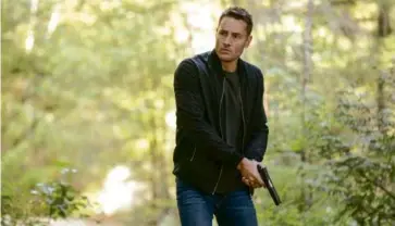  ?? MICHAEL COURTNEY/CBS VIA AP ?? Justin Hartley as Colter Shaw in “Tracker,” his follow-up to “This Is Us.”