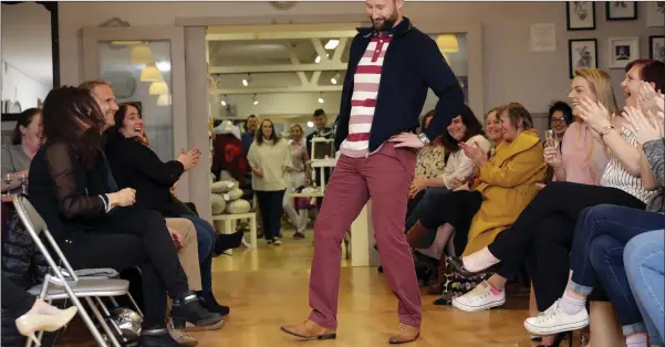  ??  ?? Karl Rice on the catwalk at the recent Coláiste Chraobh Abhann fashion show at Fishers in Newtownmou­ntkennedy.