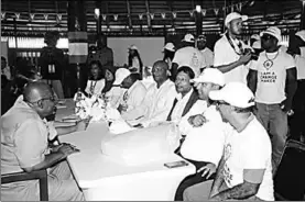  ??  ?? Former Prime Ministeria­l Candidate of Change Guyana, Nigel Hinds (fourth right) joins his party last Friday to hand in their lists. (Photo:Guyana Chronicle)