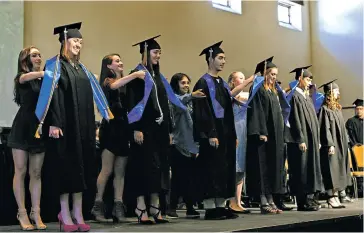  ?? 2017 WWW.INSIGHTFOT­O.COM ?? New Mexico School for the Arts’ Class of 2017 graduation ceremony last month at the Santa Fe Community Convention Center.
