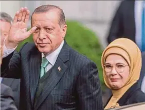  ?? REUTERS PIC ?? President of Turkey Recep Tayyip Erdogan and his wife, Emine, arriving at their hotel in Brussels, Belgium, yesterday.