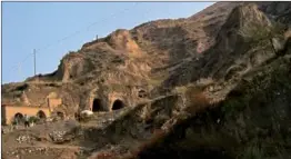  ??  ?? The cave where 79-year-old Zhang Dehua lives is a few kilometers from the Yungang Grottoes in Datong, Shanxi province.