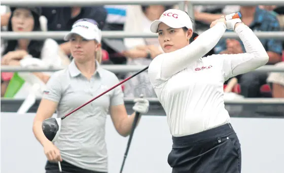  ??  ?? Moriya Jutanugarn of Thailand plays a shot in the second round at Siam Country Club yesterday.
