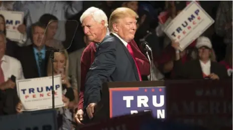  ?? STEPHEN CROWLEY/THE NEW YORK TIMES ?? Legendary U.S. college basketball coach Bobby Knight said Donald Trump “will not bring morons” into his administra­tion at a rally in Warren, Mich.