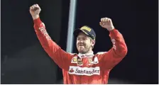  ?? LARS BARON, GETTY IMAGES ?? Sebastian Vettel, shown in November, beat Kurt and Kyle Busch for his seventh Race of Champions Nations Cup win.