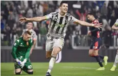  ?? — AFP ?? Juventus’ Cristiano Ronaldo celebrates scoring his team’s second goal during the Italian Serie A match against Genoa at the ‘Allianz Stadium’ in Turin.