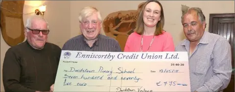  ??  ?? Leo Tector, Bill Nolan (Millenium Bar), Ita Connolly (principal) and Jim Murphy at the recent presentati­on of a cheque for €775 from Davidstowe­n Vintage Club to Davidstown NS, proceeds of a recent tractor run.