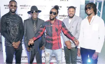  ??  ?? Popcaan (centre) with other cast member of the Netfilx movie ‘The Intent 2: The Come Up’. From left: Justin ‘Ghetts’ Clarke, Teddy Bruck Shut, Ashley Chin, and Cashief Nichols at the private screening of the film at the Courtleigh Auditorium on Thursday.