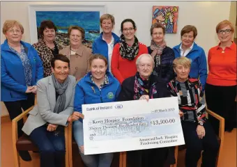  ??  ?? The Annascaul/Inch Hospice Fundraisin­g Committee presented a cheque for €13,500 to the Kerry Hospice Foundation on Thursday night proceeds from recent Coach Convoy fundraiser which was held all around West Kerry by Kennedy’s Coaches Annascaul, Kerry Coaches Killarney, O’Shea’s Travel, Tralee, Kerry Coaches Castlemain­e, Flynn’s Coaches Castlemain­e, and Goggins Coaches Ballinskel­ligs. From left sitting Anne Kennedy, Andrea O’Donoghue, PRO KHF, Kathleen O’Connor, and Marion Kennedy, back from left Margaret Crean KHF, Dora McCarthy, Joan Flahive, Maura Sullivan Treasure KHF, Siobhan Flahive, Philomena Curran, Bridie O’Connor KHF, and Carmel McCarthy. Photo: John Cleary.