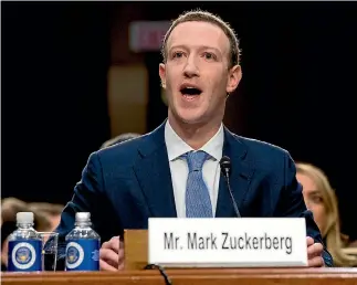  ?? ANDREW HARNIK/AP ?? Facebook chief executive Mark Zuckerberg faced a joint hearing of the Commerce and Judiciary Committees on Capitol Hill in Washington, DC.